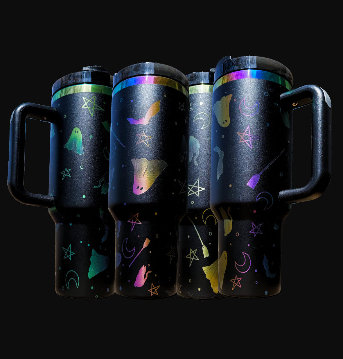 40oz iridescent black "The Spooky" tumbler with laser engraved view of ghosts, bats, brooms, stars, and crescent moons  over dots, shown from four angles