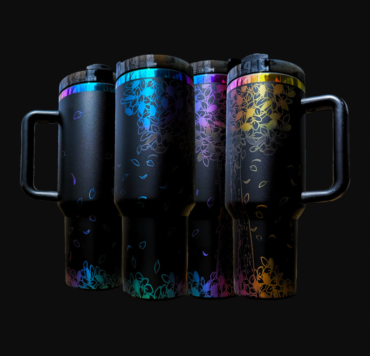 40oz iridescent black "The Tree" tumbler with laser engraved view of a tree shedding leaves, shown from four angles